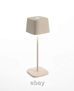 Lampe sans fil Zafferano Ofelia Table Pro (sable) avec base de chargement en aluminium IP54